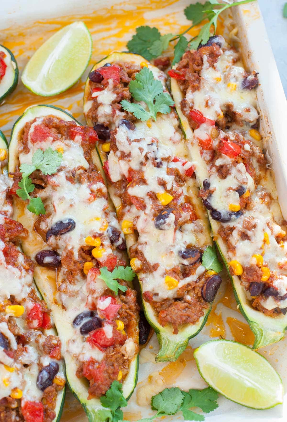 Mexican zucchini boats on a baking tray.