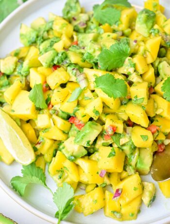 Mango avocado salsa on a white plate.